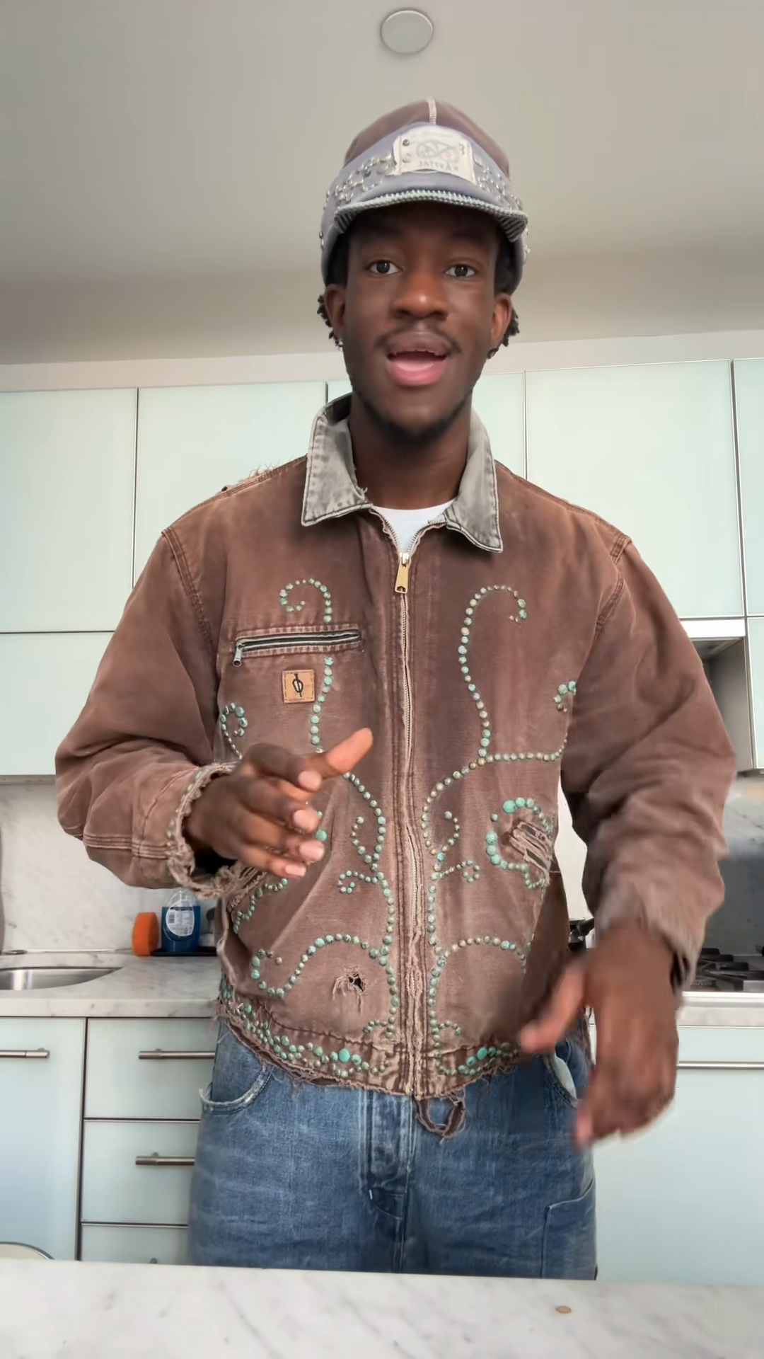 Brown Distressed Denim Jacket with Turquoise Embellishments