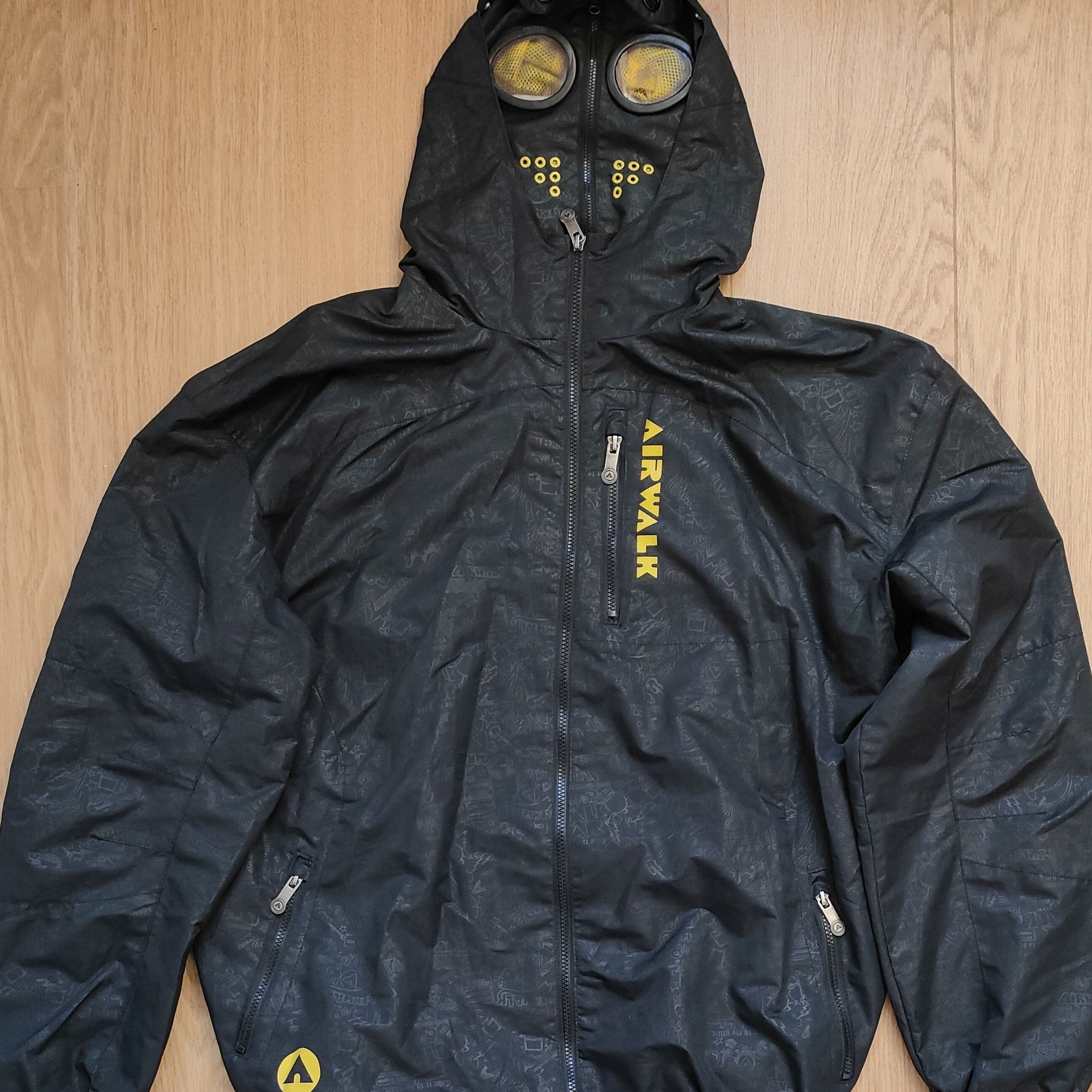 Black hooded jacket with goggles